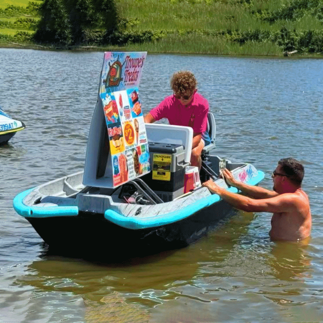 Customers and summer river scene